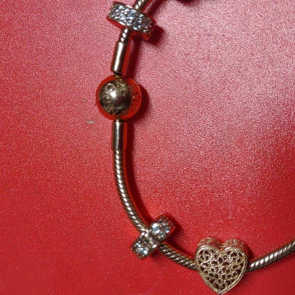 Authentic Pandora Beautiful 14k Rose gold bracelet with customized charms. - Picture 6 of 7